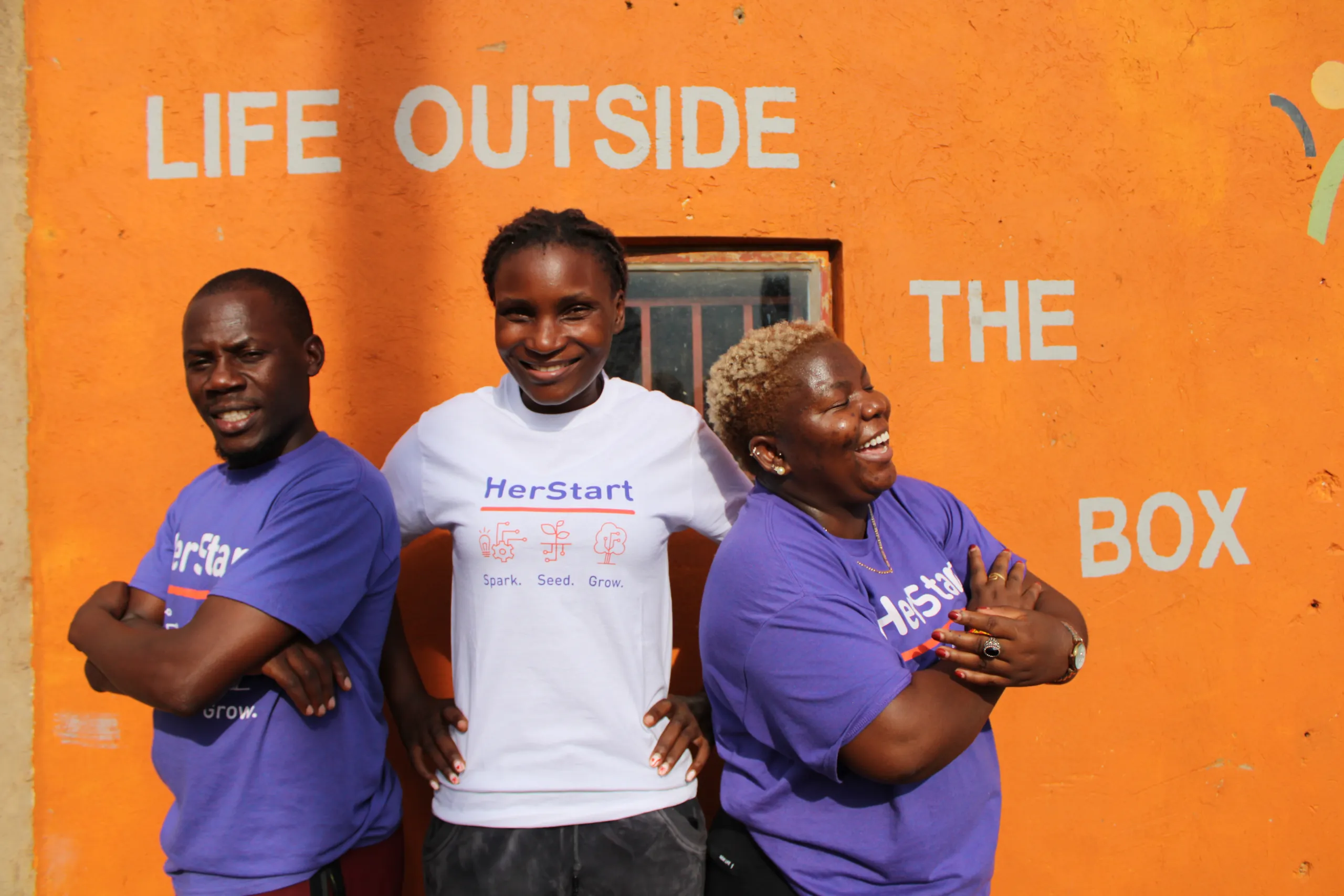 Volunteer meeting with staff and entrepreneur in Uganda