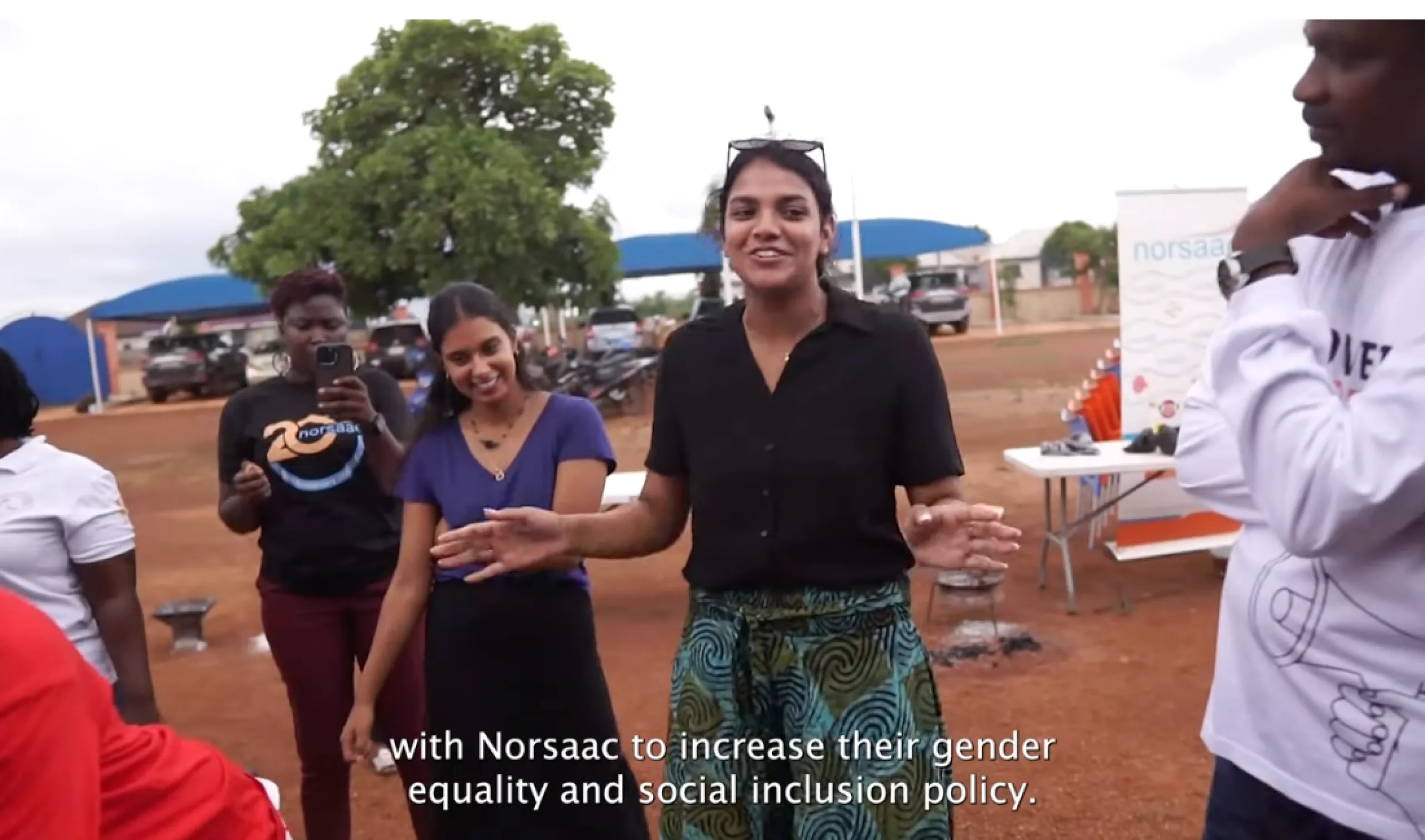 Batool speaks to community members in Ghana