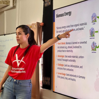 PHOTO: Zainab delivering training to CARE staff.